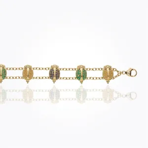 18K Scarab Bracelet in blue sapphire, emerald, and diamond