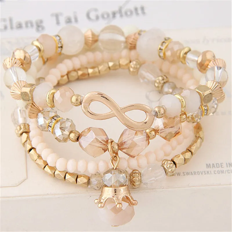 Crystal figure eight crown drop bracelet