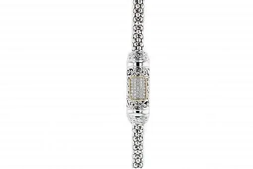 Italian sterling silver flex bracelet with 0.50ct. diamonds and solid 14K yellow gold accent