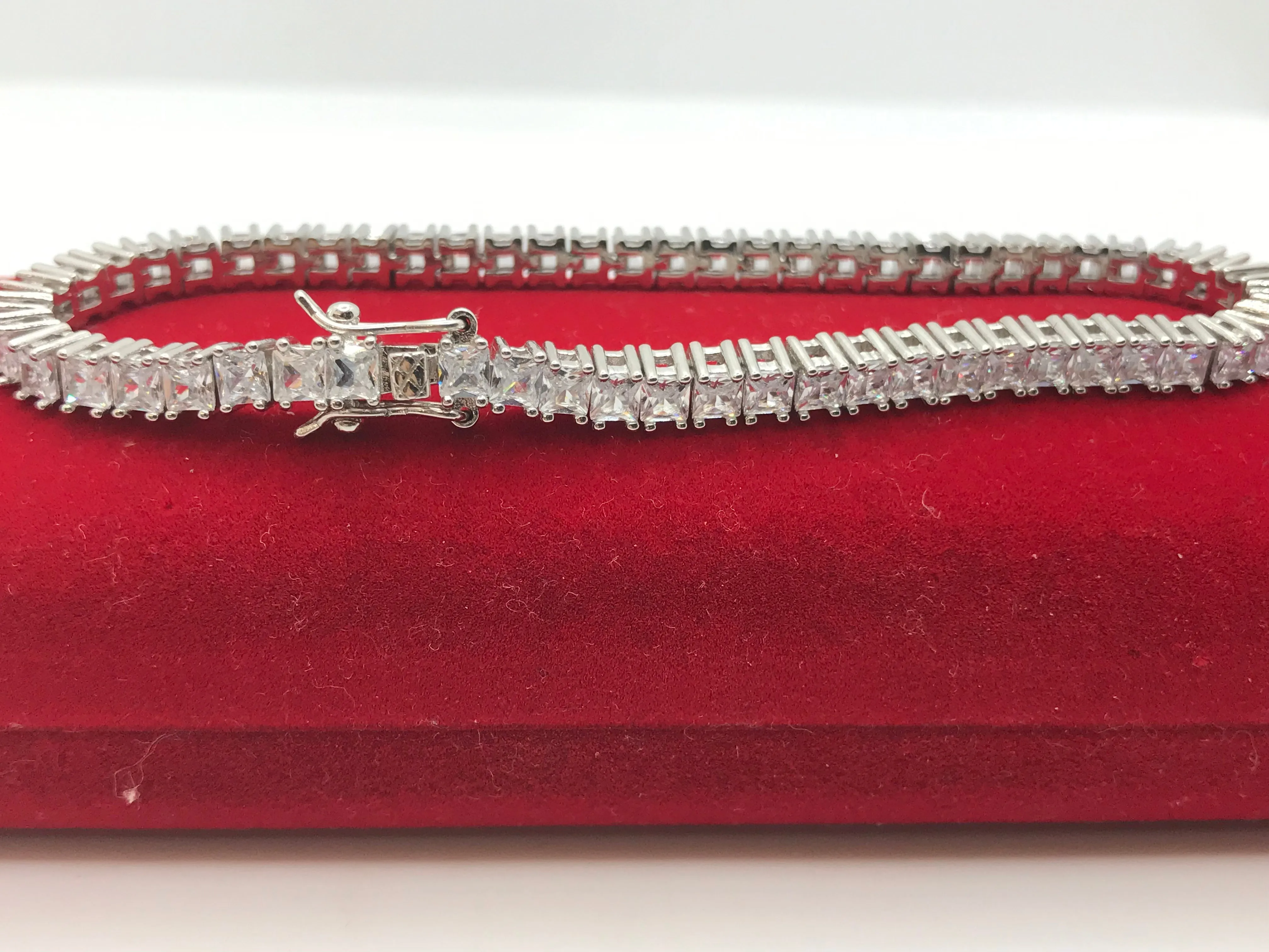 Sterling silver emerald cut tennis bracelet